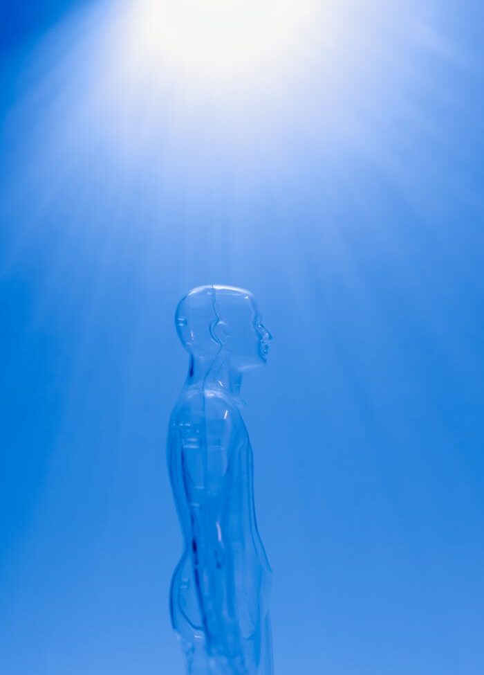 Clear Mannequin on Blue Background
